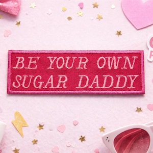 May include: A set of three ceramic mugs with a speckled, matte finish. The mugs are in shades of cream, light gray, and dark gray. Each mug has a simple, minimalist design, perfect for coffee or tea.