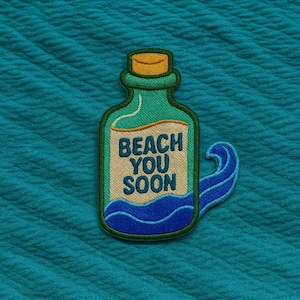 May include: Embroidered patch in the shape of a bottle with the text "BEACH YOU SOON". The bottle is green with a tan label and a cork top. Blue waves and a blue wave-shaped design are also included.