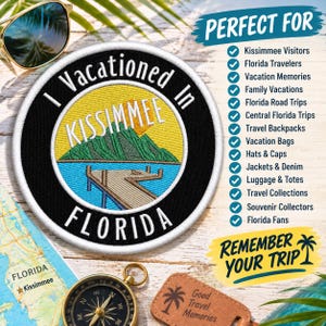 May include: A circular embroidered patch with a black border and white stitching. The centre features a yellow sun, green mountains, and a blue lake with a wooden dock. The text reads I Vacationed In KISSIMMEE FLORIDA in white lettering.