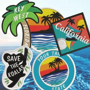 May include: Embroidered patches featuring travel destinations and conservation messages. Designs include a palm tree with "Key West Florida", a sunset scene, a koala with "Save the Koalas", and "California" with a beach scene.