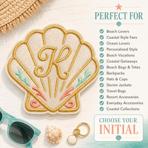 May include: An embroidered seashell patch featuring a gold-stitched letter K in the center, accented with light green and coral-colored details. The patch is displayed alongside light blue sunglasses, a small seashell, and a gold-toned keychain.