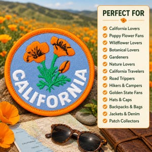 May include: A circular embroidered patch featuring orange California poppies with green stems on a light blue background. The word CALIFORNIA is stitched in white capital letters along the bottom. An orange border frames the patch.