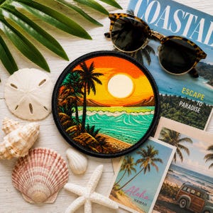May include: A circular embroidered patch featuring a vibrant tropical sunset scene with a bright yellow sun, orange sky, turquoise ocean waves, and dark palm tree silhouettes. The patch has a thick black stitched border and a detailed landscape design.