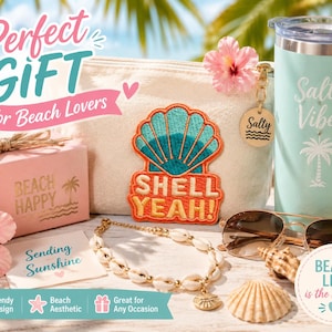 May include: A gift set featuring a light green tumbler with the text Salty Vibes, a beige pouch with a shell patch reading SHELL YEAH!, a pink box labeled BEACH HAPPY, a shell necklace, sunglasses, and a card with the text Sending Sunshine.