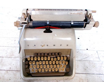 ancient TRIUMPH typewriter retro vintage
