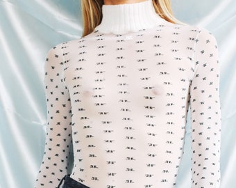 Courrèges Vintage mesh Turtleneck top // Sheer White, Black logo print // Mod 60s