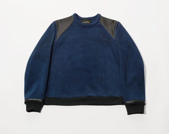 Navy Blue Fleece Sweatshirt with Black Leather Should Accent.