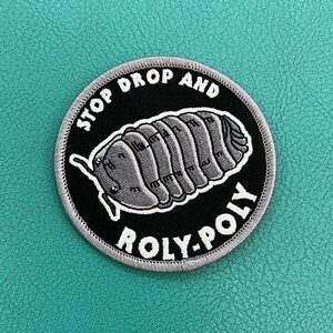 May include: A black and white embroidered patch with a gray roly-poly bug and the text "Stop Drop and Roly-Poly".