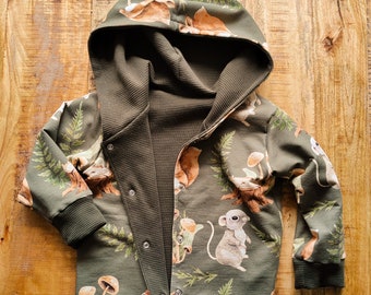 Unisex, lightweight waffle cotton jacket with squirrel and mice lining. Double layer, reversible. Baby & toddler sizes. Made in the UK