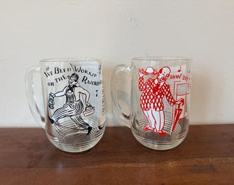 Vintage Set of 2 Mid Century 1950’s Hazel Atlas Song Lyric Glass Coffee Mugs