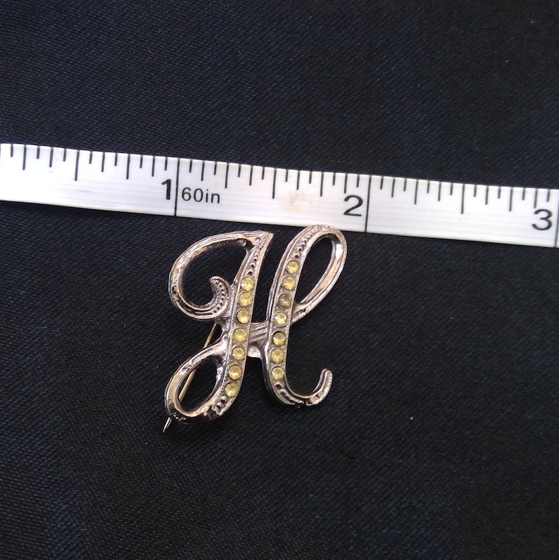 Letter H lapel or beret pin