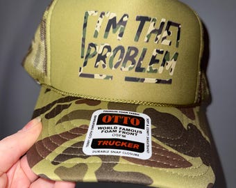 I’m the problem Camo Trucker Hat