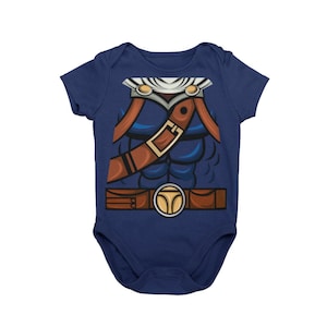 May include: A navy blue baby onesie with a cartoon image of a superhero's torso, featuring a brown belt and a white sash.