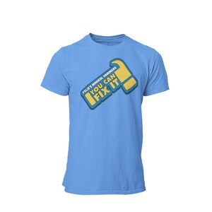 May include: A light blue t-shirt with a yellow and blue graphic of a hammer with the text "Felix's Magical Hammers You Can Fix It".