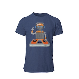 May include: A navy blue t-shirt with a pixelated image of a robot wearing headphones and mixing music on a turntable.