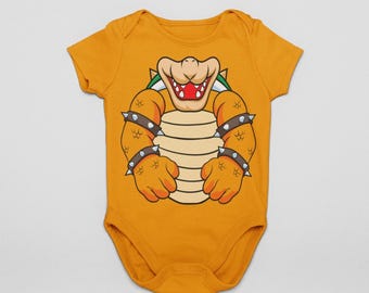 Fire Turtle King Baby Bodysuit | Yellow Spiked Monster Costume | Gamer Baby Cosplay | Halloween Dress-Up | MNSSHP Costume | Bows Costume
