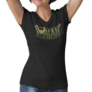 May include: Black V-neck t-shirt with a green and gold graphic that says "VARIANT" with a stylized image of a snake.