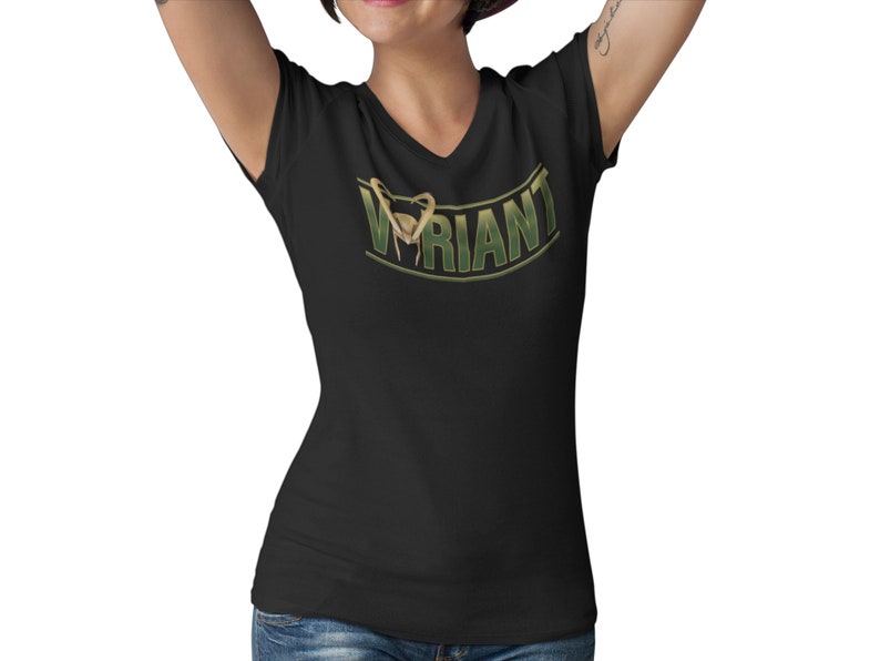 May include: Black V-neck t-shirt with a green and gold graphic that says "VARIANT" with a stylized image of a snake.