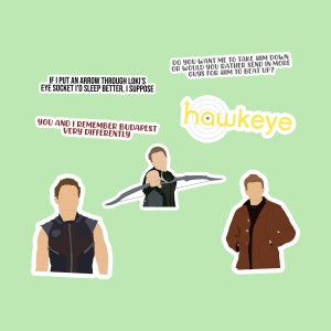 May include: A collection of stickers featuring illustrations of Hawkeye and quotes from the character. The stickers include images of Hawkeye with a bow and arrow, and text such as "You and I remember Budapest very differently."