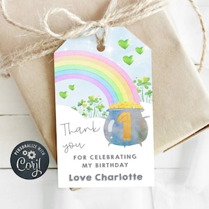 May include: A blue and white thank you tag with a rainbow, shamrocks, and a pot of gold. The text reads "Thank you for celebrating my birthday Love Charlotte".