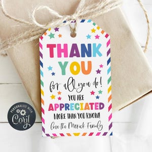 May include: A colourful thank you gift tag with white stars and rainbow stripes. The text reads "THANK YOU for all you do! You are APPRECIATED more than you know! Love the Merick Family."
