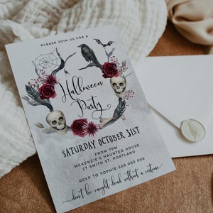 May include: A Halloween party invitation with a watercolor illustration of skulls, roses, and a raven. The text reads "Please join us for a Halloween Party, Saturday October 31st, from 7pm, McKenzie's Haunted House, 27 Smith St, Portland, RSVP to Sophie 500 000 000, don't be caught dead without a costume."