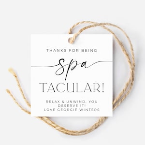 May include: White gift tag with black text that reads "Thanks for being Spa Tacular! Relax & unwind, you deserve it! Love Georgie Winters."