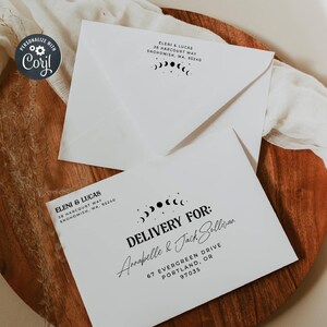 May include: Two white envelopes with black text. One envelope has the address "ELENI & LUCAS" and the other says "DELIVERY FOR: Annabelle & Jack Sullivan". Both envelopes have a celestial moon phase design.