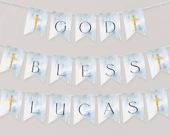 Pode incluir: Uma faixa azul e dourada com o texto "God Bless Lucas" e cruzes douradas em cada extremidade. A faixa é perfeita para um batismo.