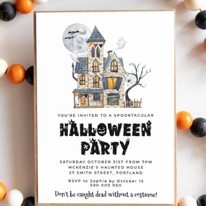May include: A Halloween party invitation with a watercolor illustration of a spooky house with a full moon, bats, and ghosts. The text reads "You're invited to a spooktacular Halloween Party. Saturday October 31st from 7pm McKenzie's Haunted House 27 Smith Street, Portland RSVP to Sophia by October 15 500 000 000 Don't be caught dead without a costume!"