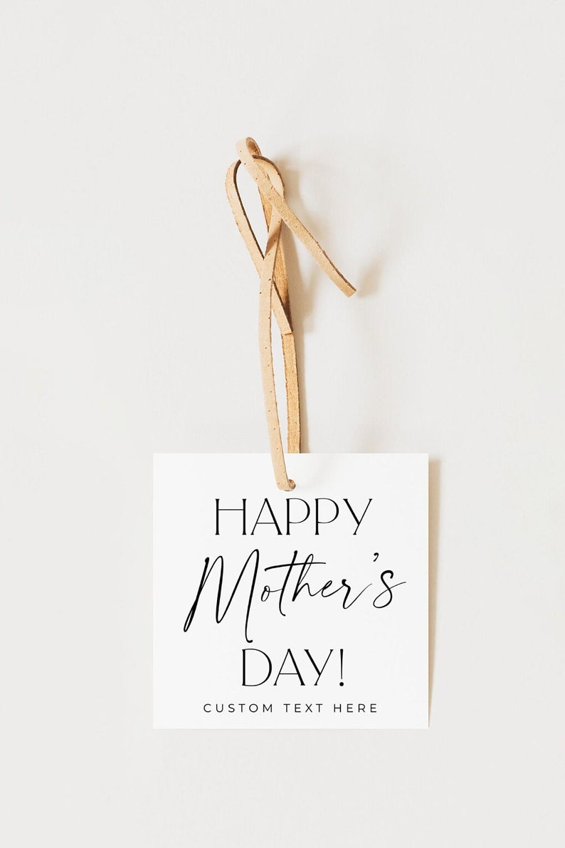 May include: White gift tag with black text that reads "Happy Mother's Day!" and "CUSTOM TEXT HERE". The tag is attached to a brown leather cord.