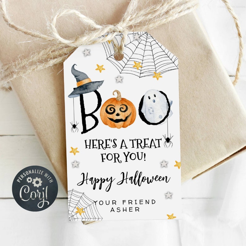 May include: A white gift tag with a spiderweb design, a pumpkin, a ghost, and the text "BOO HERE'S A TREAT FOR YOU! Happy Halloween YOUR FRIEND ASHER".