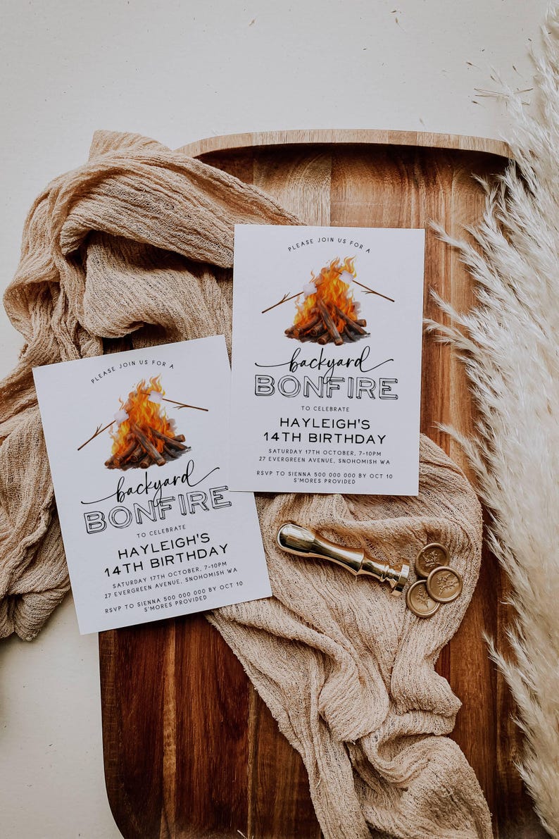 May include: Two white invitation cards with a campfire illustration and the text "backyard bonfire" to celebrate Hayleigh's 14th birthday. The cards include the date, time, location, and RSVP information.
