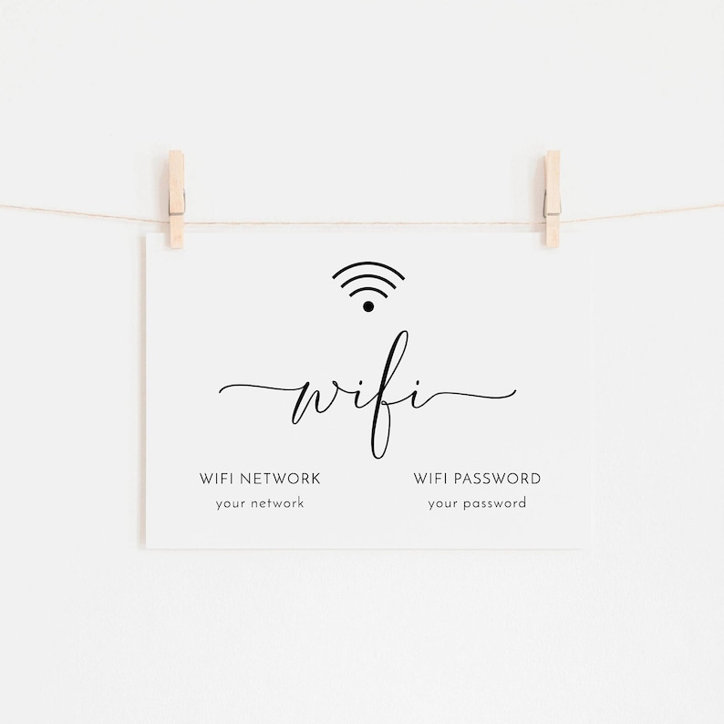 May include: A white sign with the word "wifi" in a cursive font, along with a wifi symbol. The sign is held by two wooden clothespins on a string. Below the word "wifi" are the words "WIFI NETWORK your network" and "WIFI PASSWORD your password".