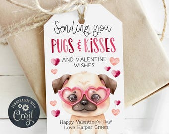 May include: A white gift tag with a cartoon pug wearing pink heart-shaped glasses. The text on the tag reads "Sending you PUGS & KISSES and Valentine wishes. Happy Valentine's Day! Love Harper Green."