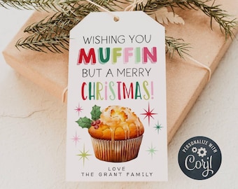 May include: A white gift tag with a colourful illustration of a muffin and the text "Wishing you muffin but a merry Christmas!"  The tag also includes the text "Love, The Grant Family" and a small logo that says "Personalize with Corjl".