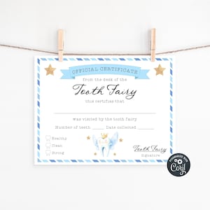 May include: A blue and white Tooth Fairy certificate, hanging from a clothesline. The certificate has a blue border and includes text such as "Official Certificate" and "Tooth Fairy." A cartoon tooth with a crown is also featured.