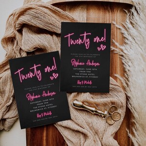 May include: Two black invitation cards with pink neon text that reads "Twenty one!" and "Stephanie Anderson". The cards are decorated with small pink hearts and include details for a 21st birthday party.