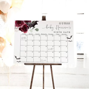 May include: A white printable calendar with a black border and black text. The calendar is for guessing baby Harrison's birth date. The calendar is decorated with a watercolor illustration of red roses, bats, and greenery. The text "GUESS baby Harrison's BIRTH DATE" is at the top of the calendar.