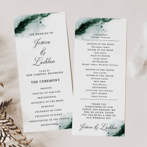 May include: Two wedding program cards with a watercolor design in shades of green and white. The cards feature the names "Jessica & Lachlan" and wedding details. The ceremony details and guest list are also printed.