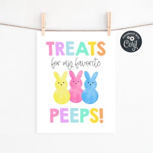 May include: A printable sign with the text "Treats for my favorite peeps!" in rainbow colors. Three yellow, pink, and blue peeps are pictured below the text.