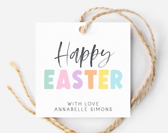 May include: White gift tag with the text "Happy Easter" in black script font. The word "Easter" is in colorful block letters with a pastel color scheme. The text "With love, Annabelle Simons" is printed in black below the greeting.