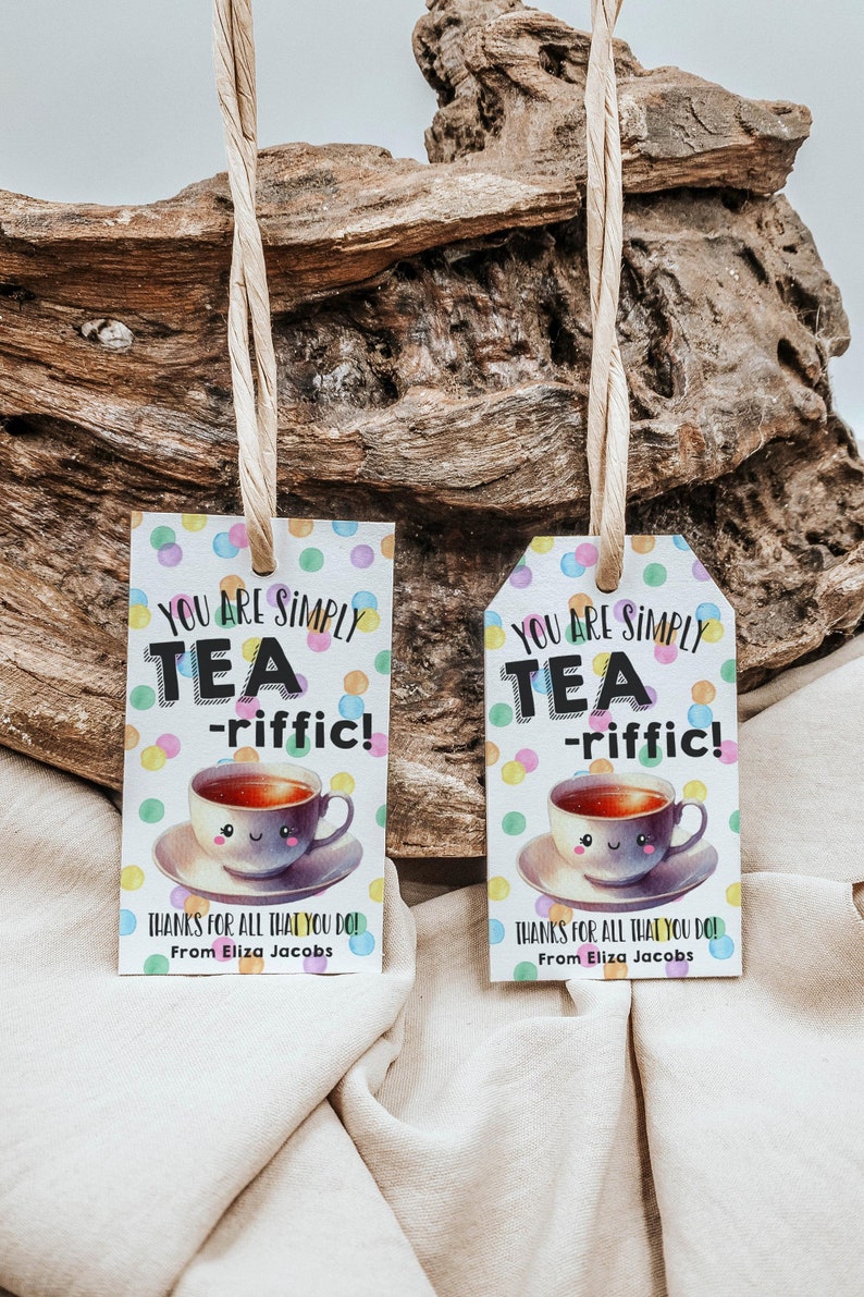 May include: Two colorful gift tags with a teacup illustration and the text "You are simply tea-riffic!"  Thanks for all that you do! From Eliza Jacobs.