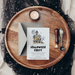 May include: A Halloween party invitation with a spooky house illustration. The invitation text reads "You're invited to a Spooktacular Halloween Party" and includes the date, time, location, and RSVP information.