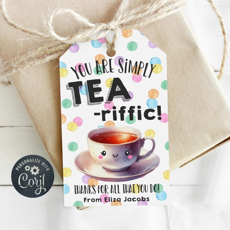May include: A white gift tag with colorful polka dots and a cartoon teacup with a smiling face. The text on the tag reads "You are simply tea-riffic! Thanks for all that you do! From Eliza Jacobs."
