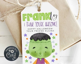 Op de afbeelding: Een wit cadeau-etiket met een illustratie van een groene Frankenstein-monster. Het etiket zegt "Eerlijk gezegd, ik vind je geweldig! Prettig Halloween! Je vriend Elijah".