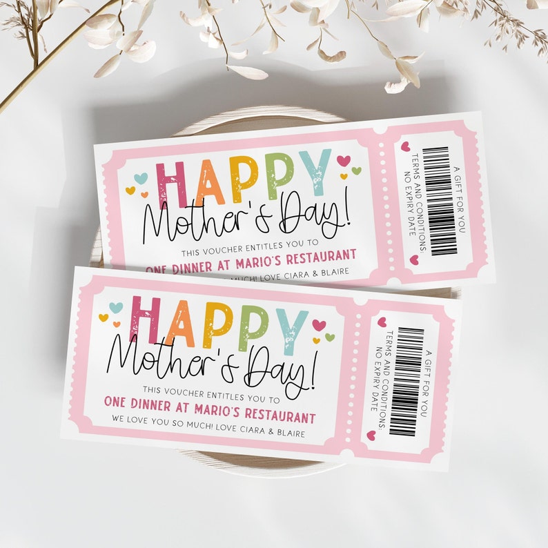 May include: Two pink and white printable gift certificates with the text "Happy Mother's Day!" and "This voucher entitles you to one dinner at Mario's Restaurant." The top certificate has the text "We love you! Love Ciara & Blair" and the bottom certificate has the text "We love you so much! Love Ciara & Blair".