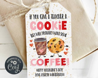 May include: A white gift tag with gold glitter and pink and red text. The tag says "If you give a teacher a cookie they will probably want some coffee!" with a cartoon cookie and coffee cup. The tag also says "Happy Valentine's Day! Love Ashlyn Winterbalm."