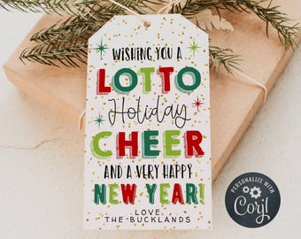 May include: A white gift tag with gold glitter and a festive message that reads "Wishing you a Lotto Holiday Cheer and a very Happy New Year! Love, The Bucklands".