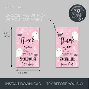 May include: Two pink and white ghost-themed thank you tags with a spider web design. The tags are 2 inches by 3.5 inches and say "Thank you for making my birthday spooktacular! Love Aria".